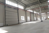 Outside Galvanized Steel Frame Industrial  Sectional Doors With High frequency Motor